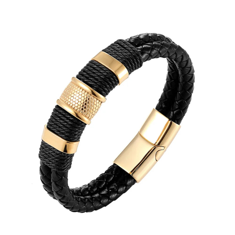 Black braided bracelet with gold accents on a white background