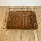 Wicker basket with dimensions marked on a wooden surface