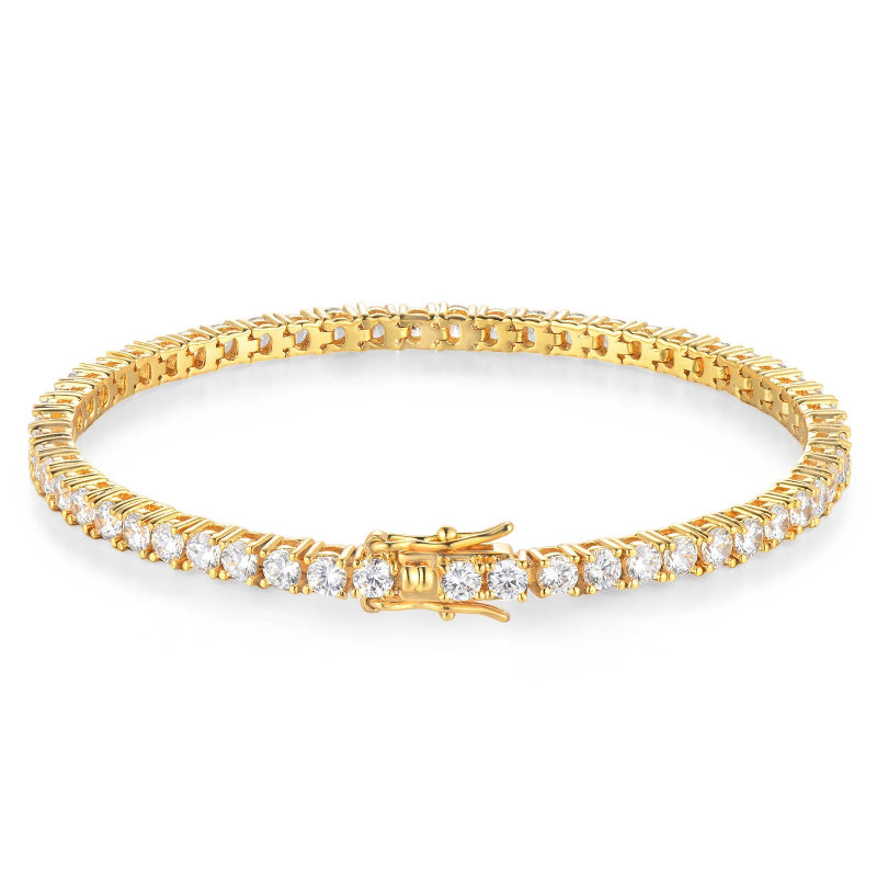 Gold bracelet with clear gemstones on a white background