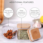 Glass containers with wooden lids on a light surface, featuring text labels about additional features.