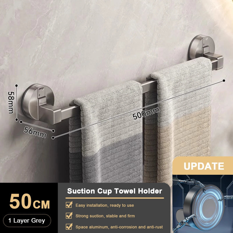 Towel holder with towel on a marble wall background, showing dimensions and features.