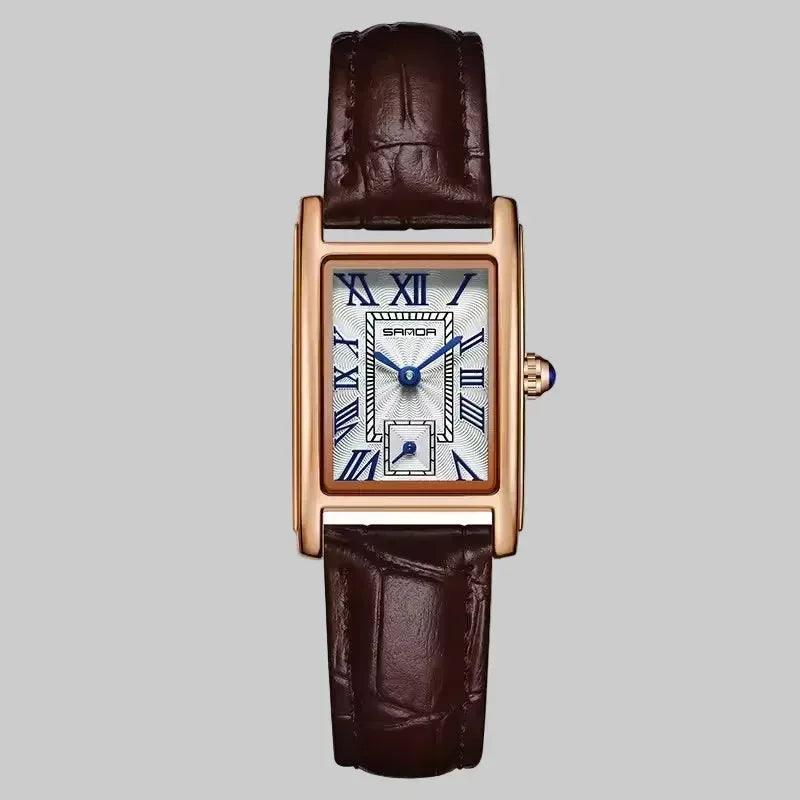 Watch with brown leather strap and rose gold case on white background, featuring the Sanda brand.