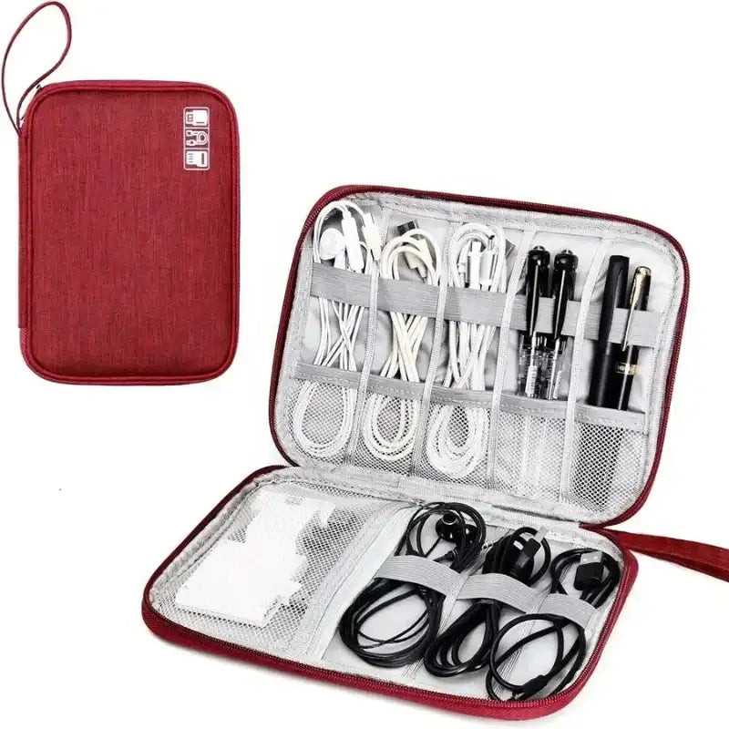 Red travel case with organized electronic cables and devices on a white background