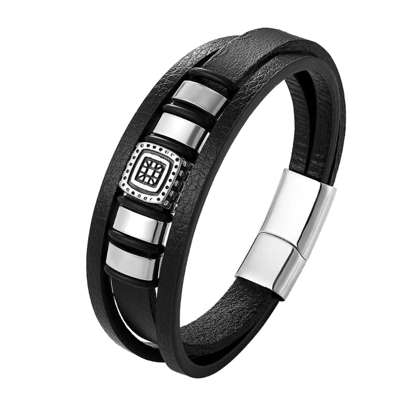 Black leather bracelet with silver accents on a white background