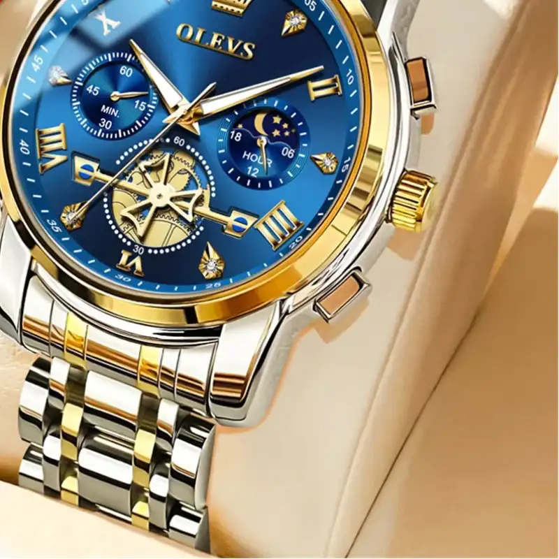 Luxury watch with blue face and gold accents, featuring the OLEVS brand.