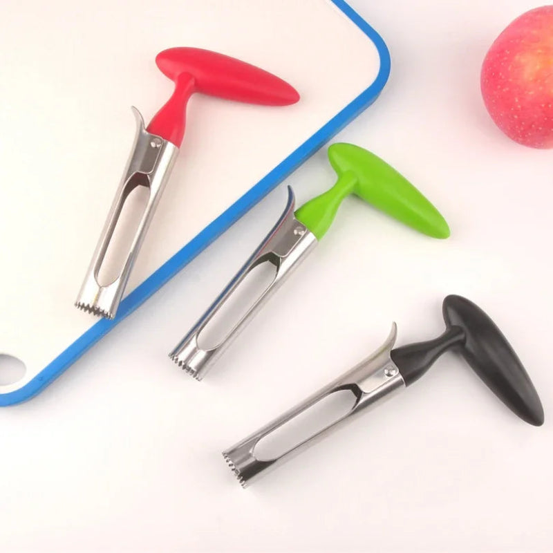 Three fruit peelers with red, green, and black handles on a white background.