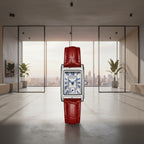 Watch with red leather strap and silver case on a white background, featuring the brand 'SANDA'.
