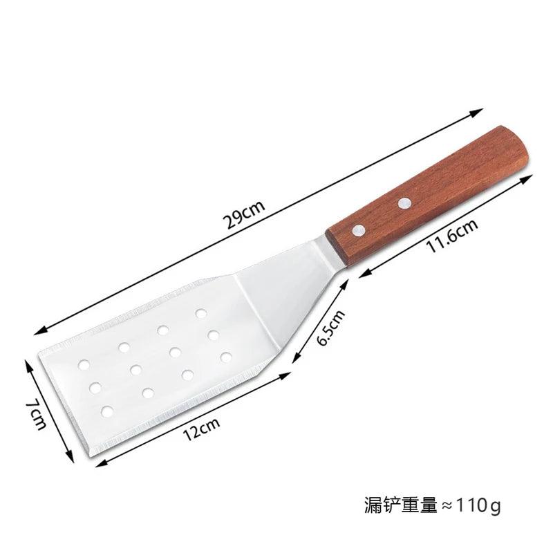 Frying spatula with wooden handle and measurements on a white background