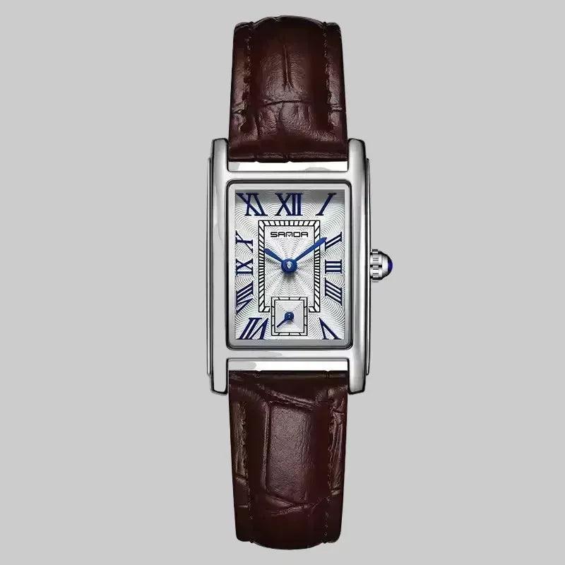 Watch with brown leather strap and silver case on a white background, featuring the brand 'SANDA'.