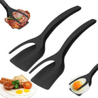 Black kitchen utensils used for various food items on a white background