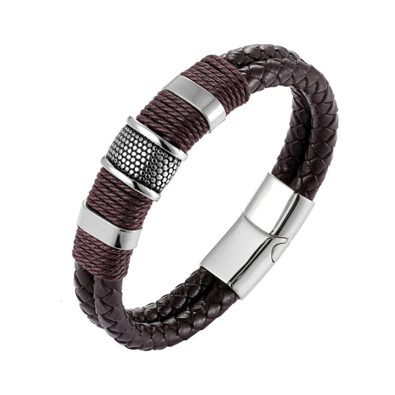 Brown braided leather bracelet with silver metal accents on a white background