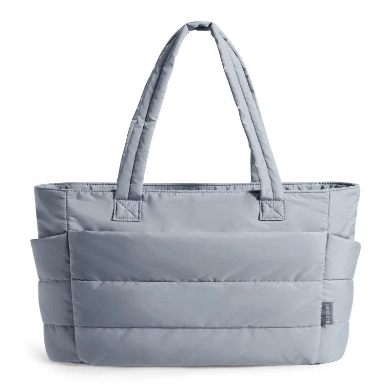 Gray tote bag with multiple pockets on a white background