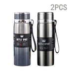 Two stainless steel bottles with labels on a white background