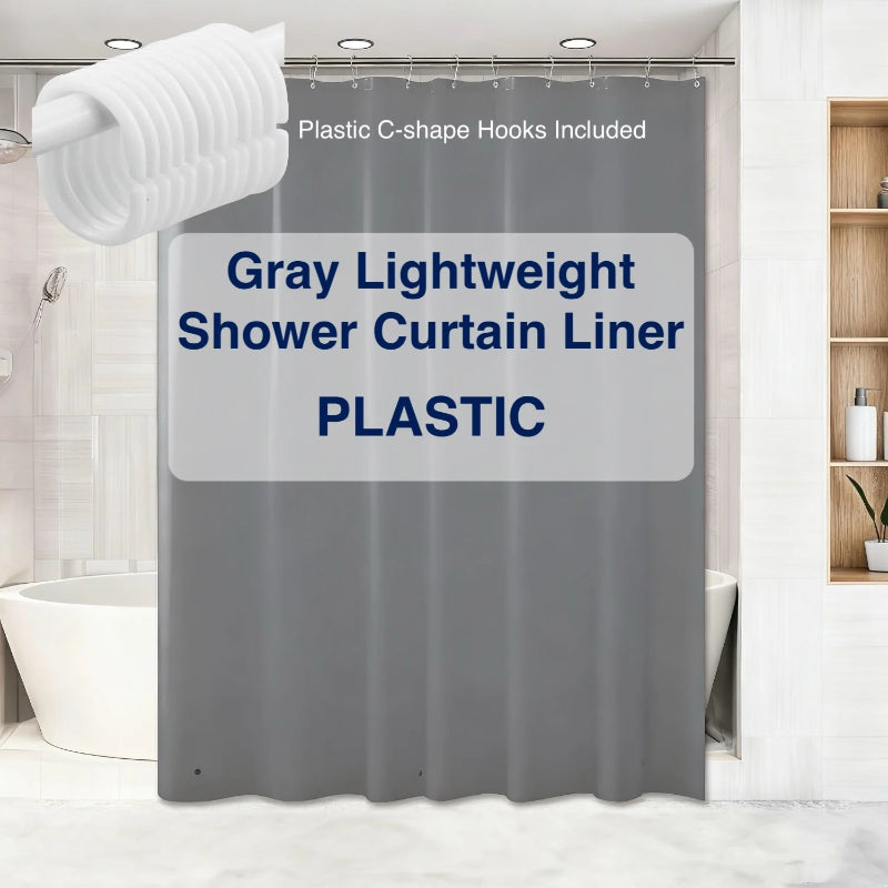Gray lightweight shower curtain liner with text on a bathroom background