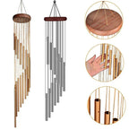 Decorative wind chime with wooden top and metal tubes on a white background