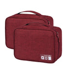 Two red travel bags with icons on a white background