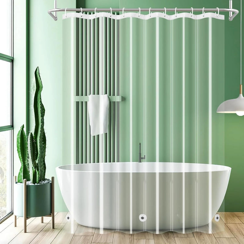Bathroom with a freestanding bathtub, clear shower curtain, and green wall.