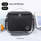 Black cooler bag with strap on a white surface, size and strap length information displayed.