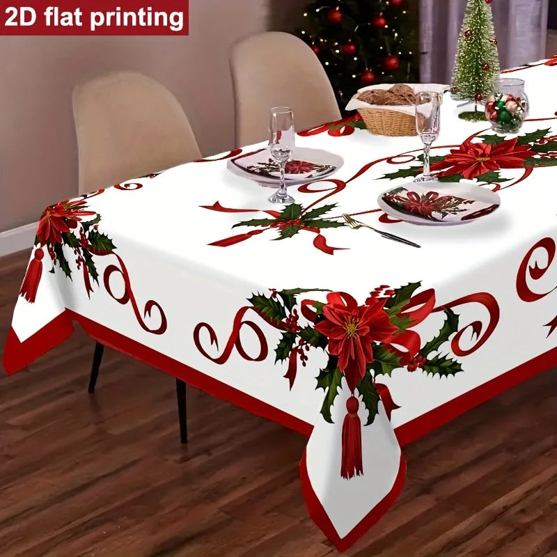 A Christmas-themed rectangular tablecloth with a white base, red borders, red bows, green holly leaves, and red tassel details, shown on a dining table set with plates, glasses, chairs, and holiday decor. A red banner in the top-left corner reads '2D flat printing'.