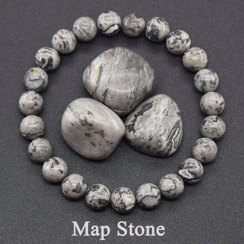 Map stone bracelet with stones arranged in a circle on a dark background