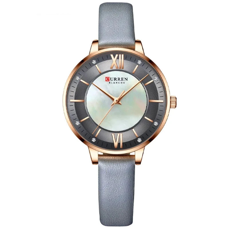 Curren watch with gray strap and rose gold case on white background