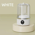White humidifier on a beige surface with 'WHITE' text above it.