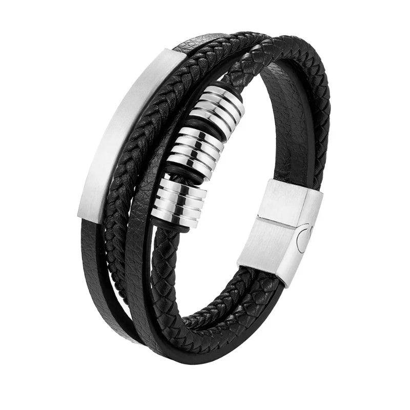 Black braided leather bracelet with silver accents on a white background
