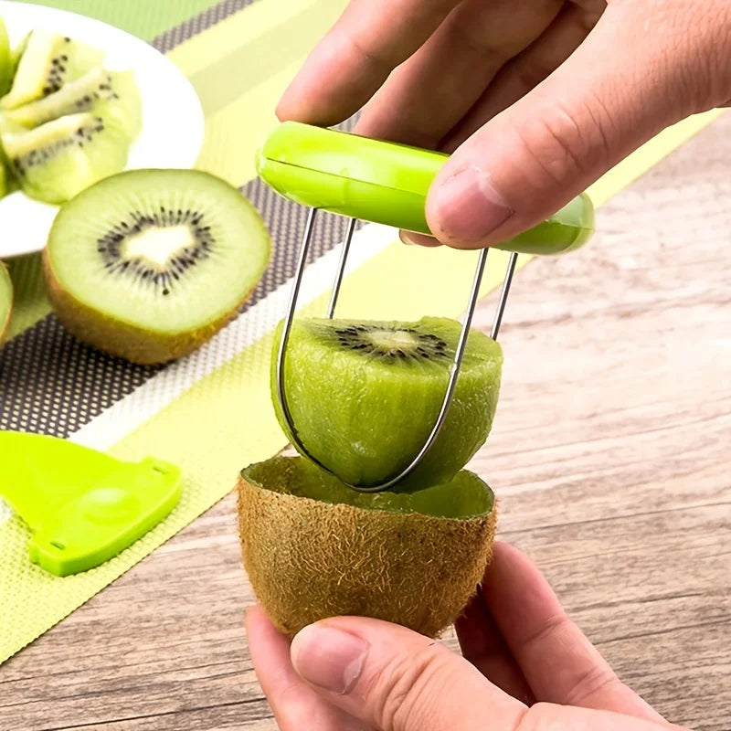 Person using a green kiwi peeler to remove the skin of a kiwi fruit on a wooden surface.