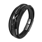 Black braided leather bracelet with metal clasp on a white background