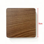 Wooden square coaster with dimensions indicated on a white background