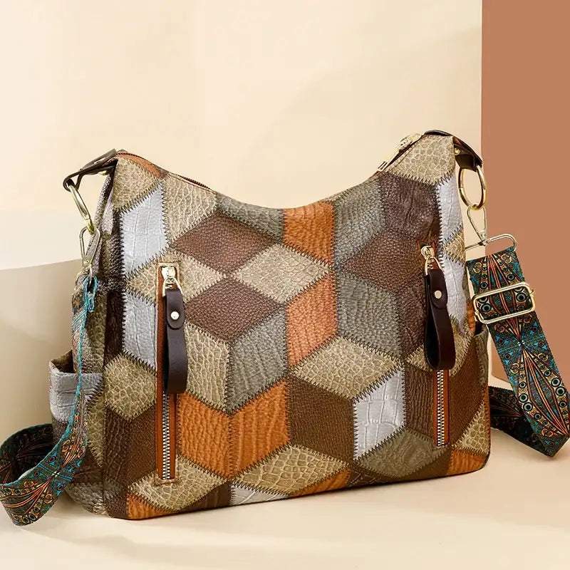 Patchwork handbag with geometric pattern on a beige background
