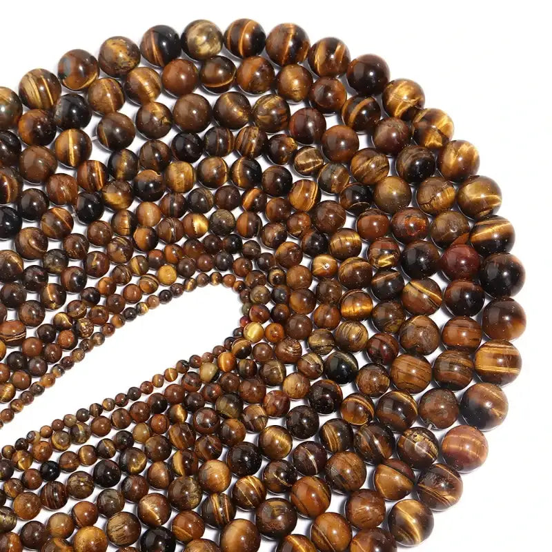 String of tiger eye beads on a white background