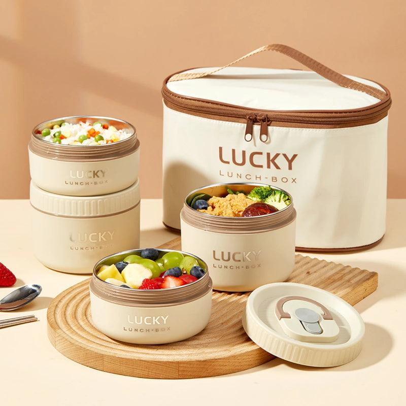 Lucky lunch box set with containers and a bag on a beige background