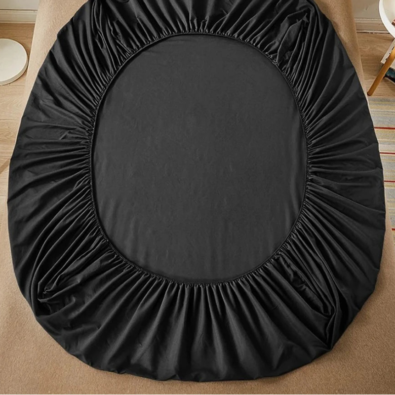 Black round seat cover on a chair with 'vave' branding.
