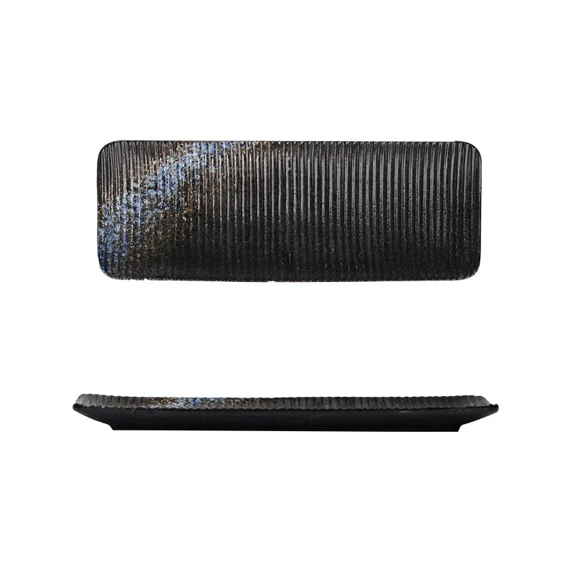 Two black textured trays on a white background