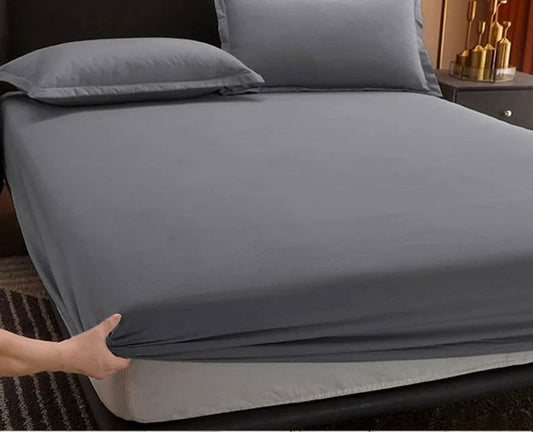 The EMESA HOME 100% Cotton Fitted Bed Sheet is a high-quality, non-slip, and adjustable bedsheet designed for various bed sizes. - Emesa Home