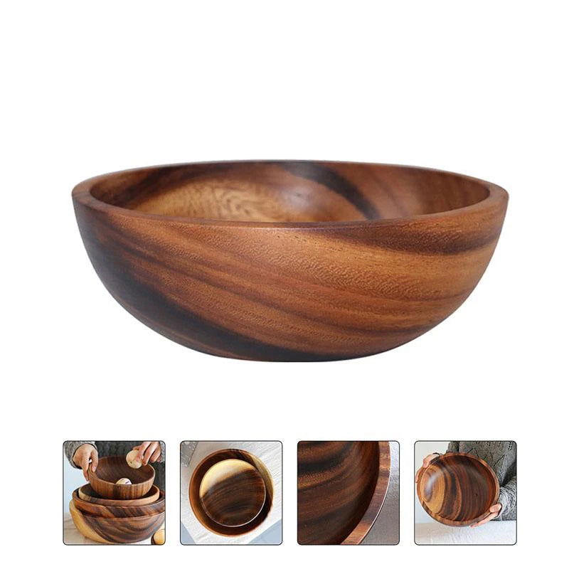 The EMESA HOME Natural Wooden Bowl is handcrafted from Acacia wood, perfect for serving fruit or salad. Its elegant design adds a natural touch to any kitchen. - Emesa Home