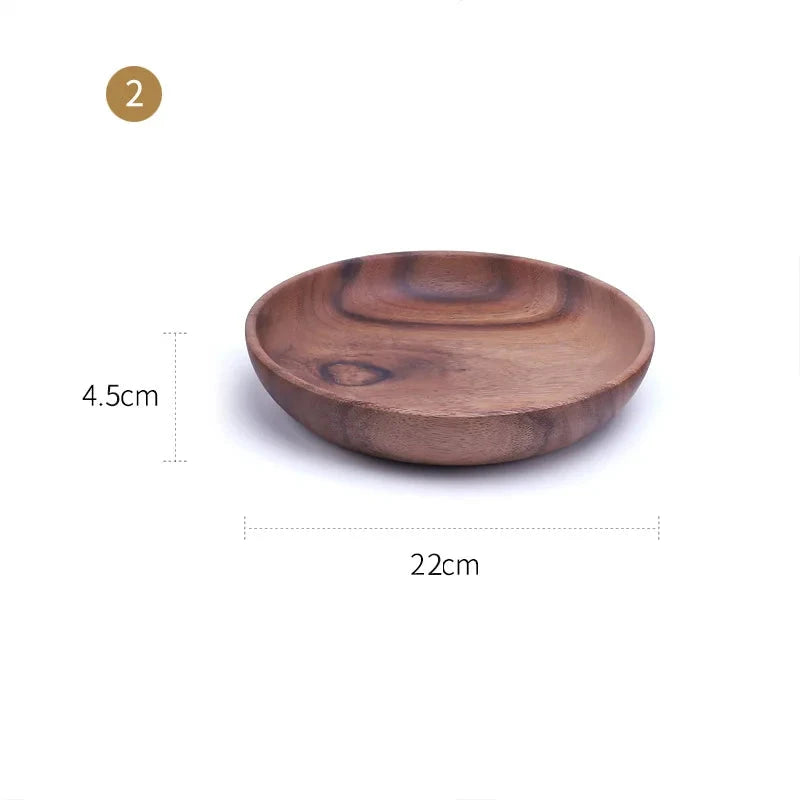 The EMESA HOME Natural Wooden Bowl is handcrafted from Acacia wood, perfect for serving fruit or salad. Its elegant design adds a natural touch to any kitchen. - Emesa Home