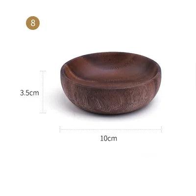 The EMESA HOME Natural Wooden Bowl is handcrafted from Acacia wood, perfect for serving fruit or salad. Its elegant design adds a natural touch to any kitchen. - Emesa Home