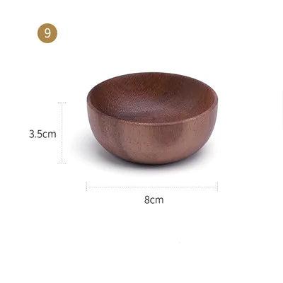 The EMESA HOME Natural Wooden Bowl is handcrafted from Acacia wood, perfect for serving fruit or salad. Its elegant design adds a natural touch to any kitchen. - Emesa Home