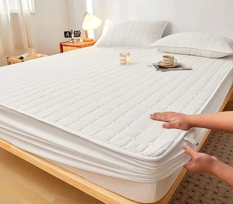 The EMESA HOME Thicken Mattress Pad Protector is a high-quality bed cover designed to provide enhanced comfort and protection for various mattress types - Emesa Home